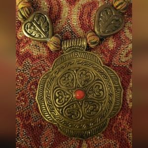 Large Medallion Cloth Wrapped Cord Necklace